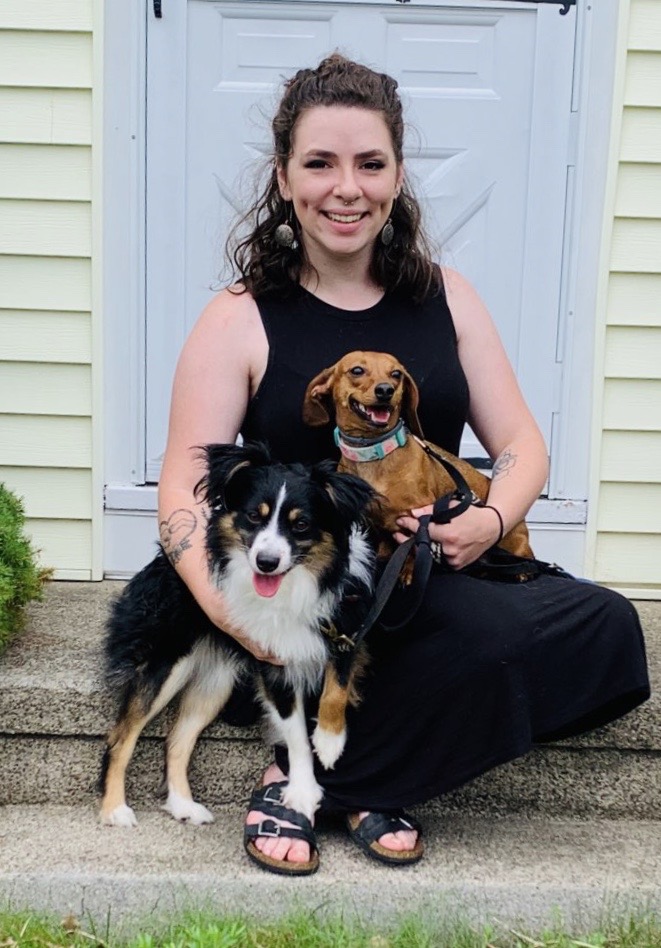 Alex K, Veterinary Technician, with "Ella and Strider"